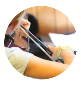 close up of student playing